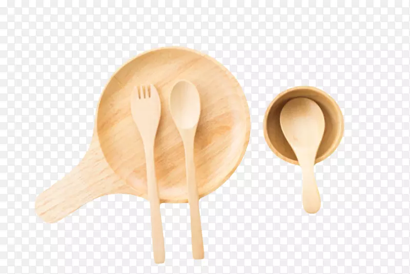 木碟子上的勺子和叉子和碗饭勺
