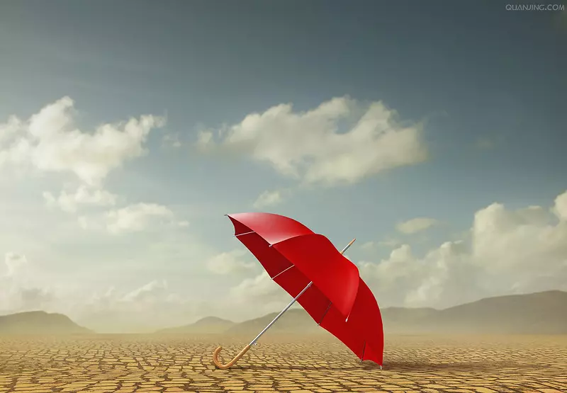 蓝天白云沙漠里的小红伞