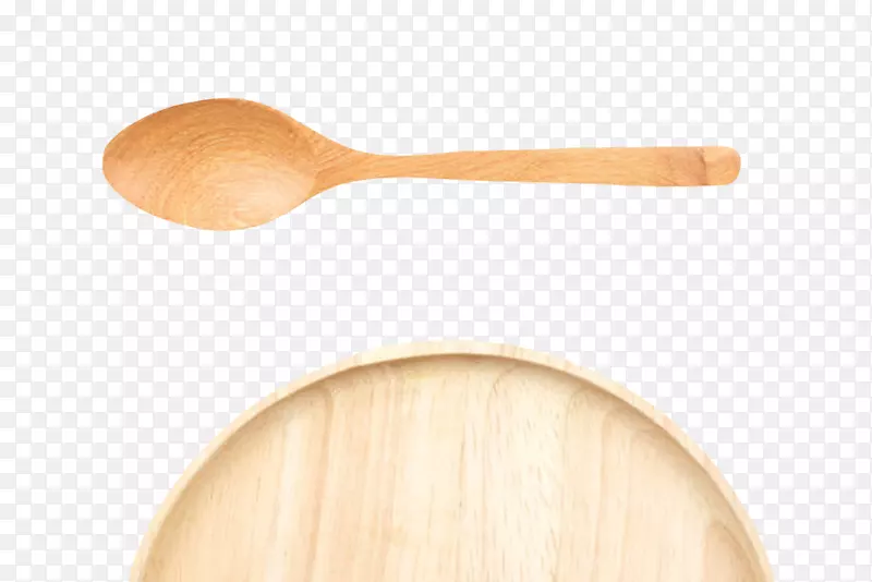 棕色木质纹理凹陷的圆木盘和勺子