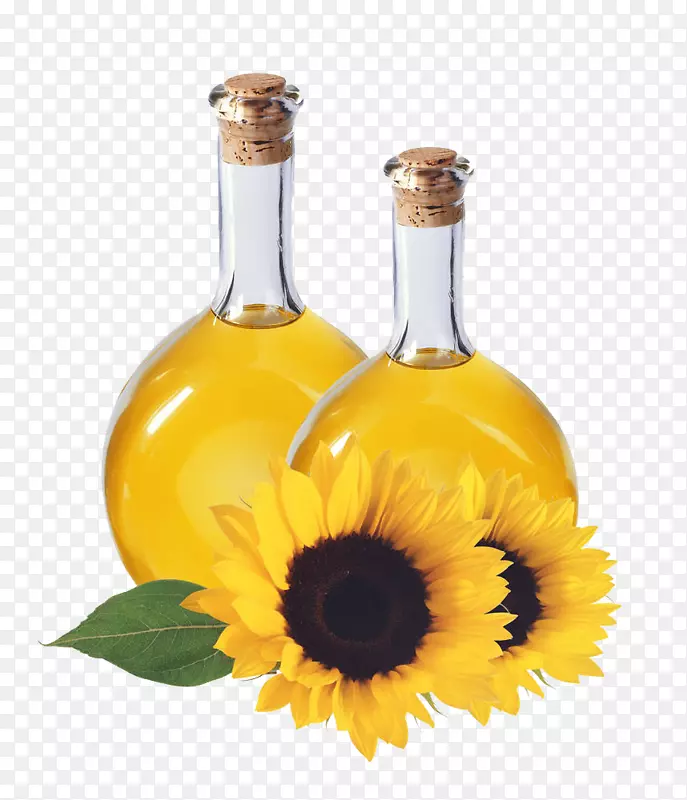 葵花油食用油瓶-两瓶葵花籽旁边的油