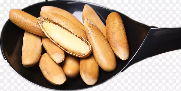 膳食补充剂匙松坚果食品.一把勺子松仁