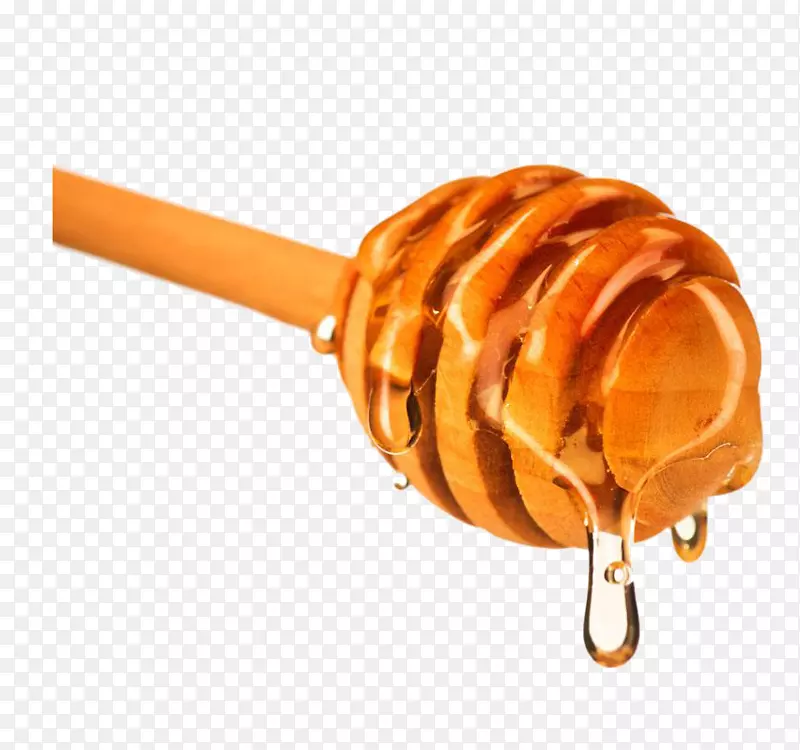 蜂蜜珩磨液体蘸酱摄影.液体上粘稠的蜂蜜