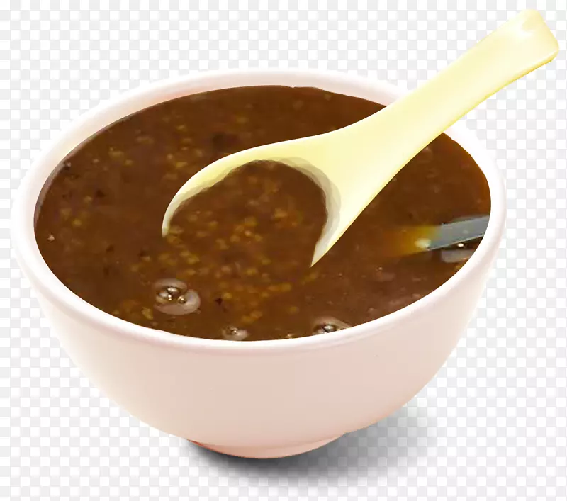 肉汁粥汤匙和一碗粥
