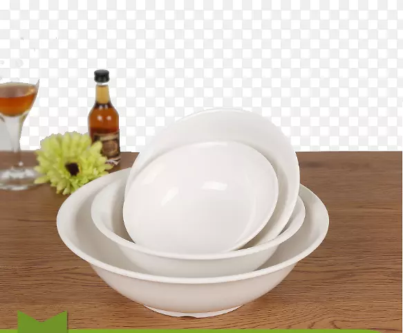 餐具碗、瓷盘、花盆和桌上的圆汤