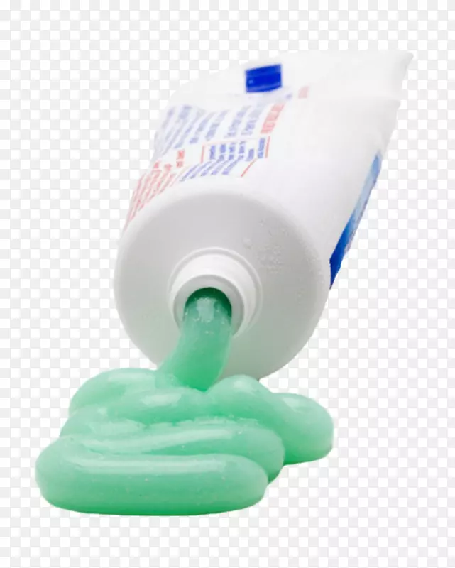 白色塑料包装牙膏管和绿色物体实