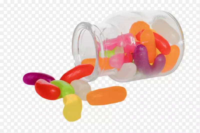 透明玻璃罐里倒出来的彩色糖果