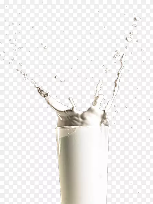 杯子外扬起的鲜牛奶