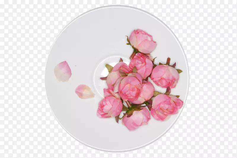 白瓷碟子里的玫瑰花