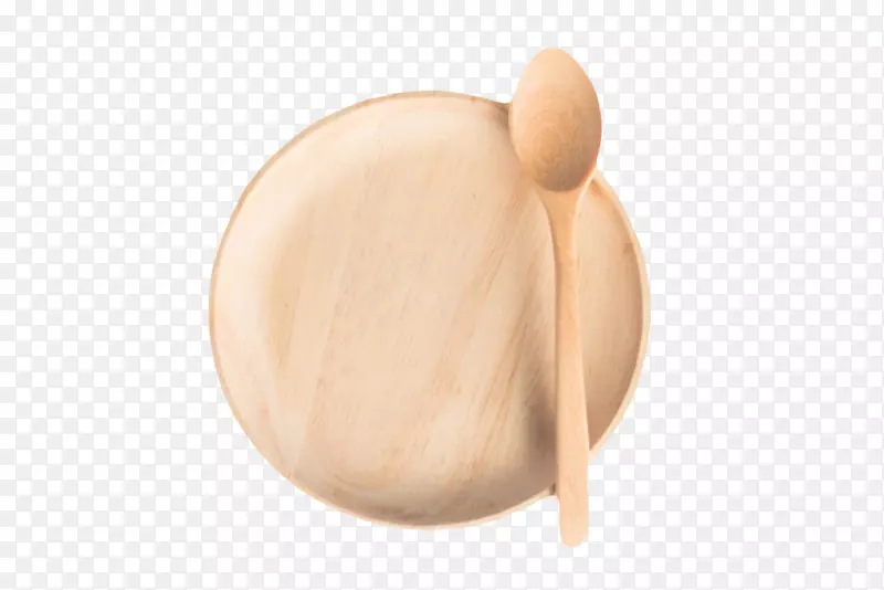 棕色木质纹理盛着木勺子的圆木盘