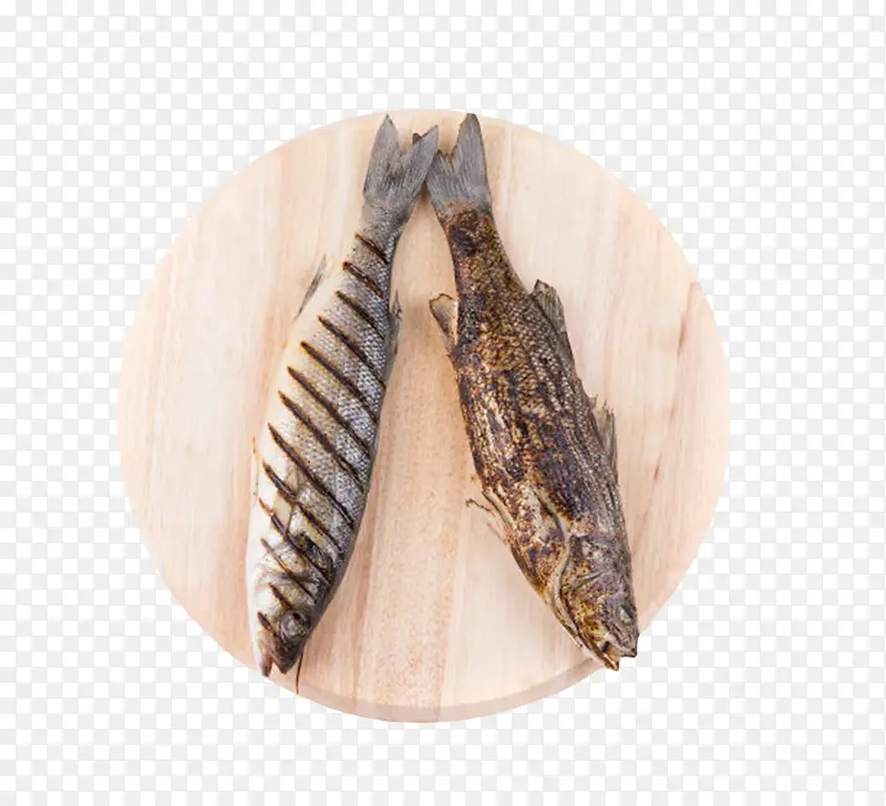 棕色木质纹理木圆盘和鱼实物