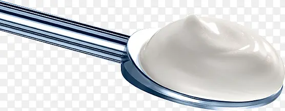勺子中的白色液体化妆品