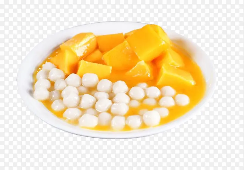 白盘子里的芒果小圆子甜品