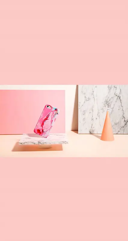 大理石上的粉色手机海报背景