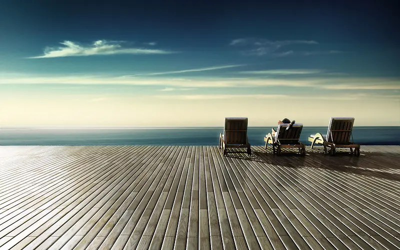 木板上看海的躺椅海报背景