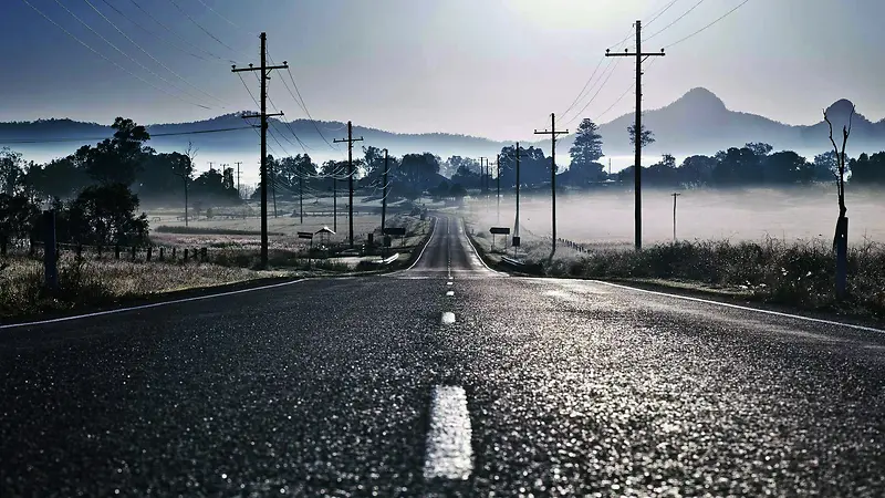 笔直的柏油马路海报背景