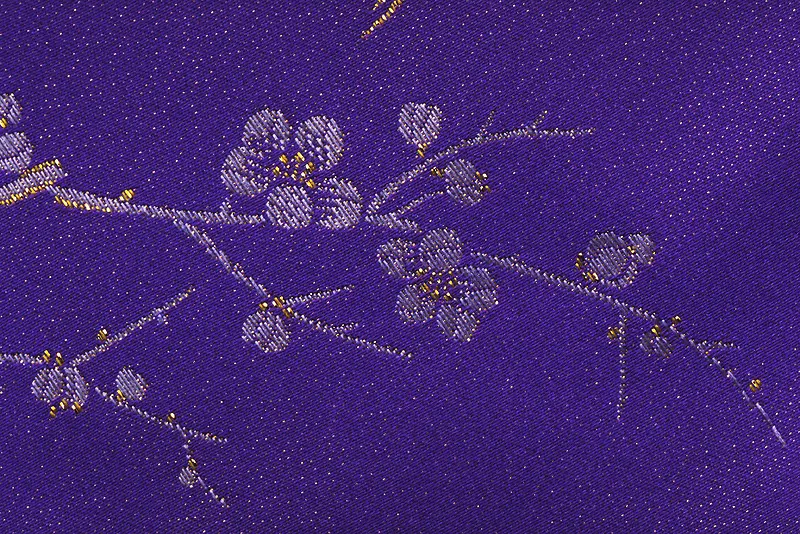 紫色绣花布料背景