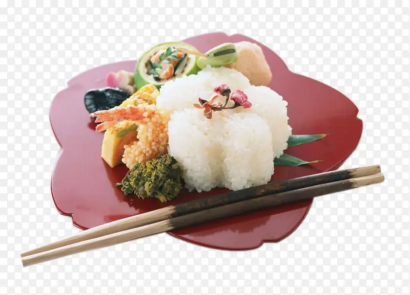 盘子里的米饭团和筷子