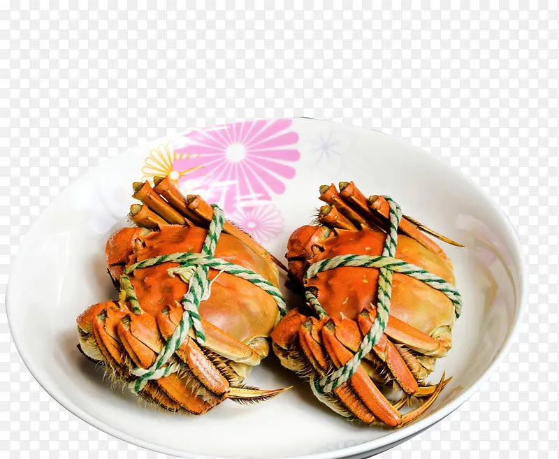 盘子里线缠绕的螃蟹