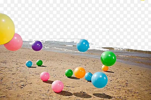 彩色水皮球弹起沙滩