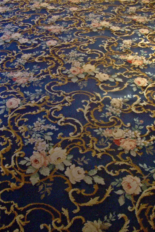 蓝色花卉图案毛纺织品背景